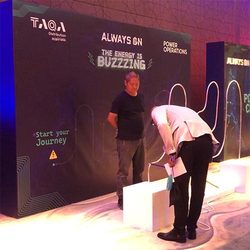 Giant Buzz Wire rental in Dubai with custom branding and wire shape for corporate events, brand activations, and carnival games in the UAE